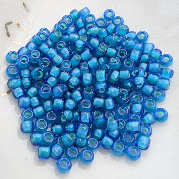 6/0-321K Turquoise Blue White/L